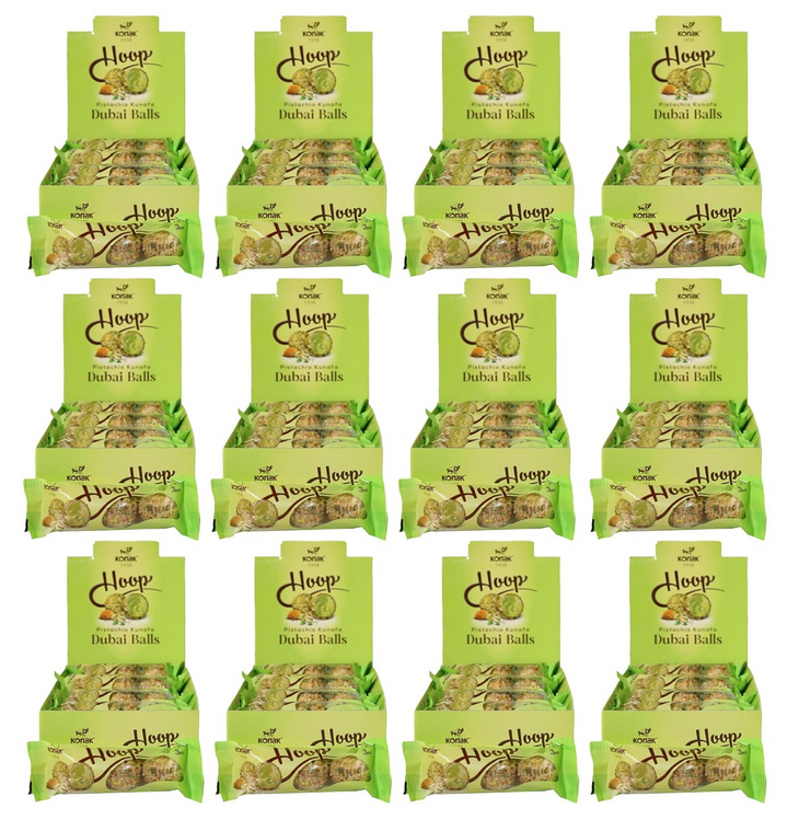 Multiple boxes of Dubai chocolate Balls with green packaging on a white background, wholesale package