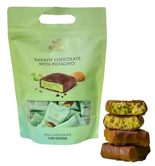 Green packaging of Kadayif dubai Chocolate with Pistachio and a stack of chocolate bars on a white background